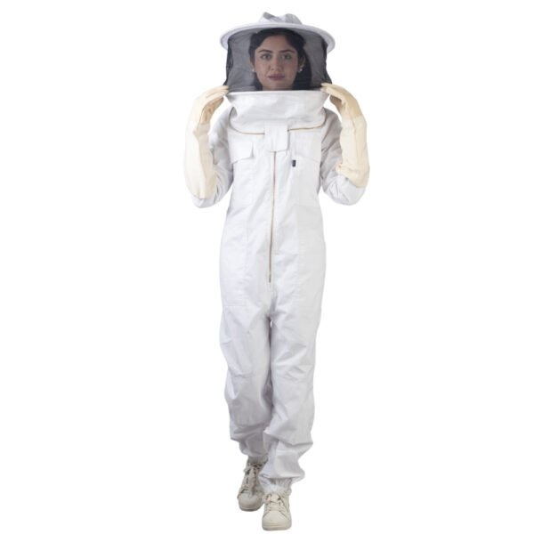 Front view of white cotton beesuit with attached veil and protective gloves for beekeeping