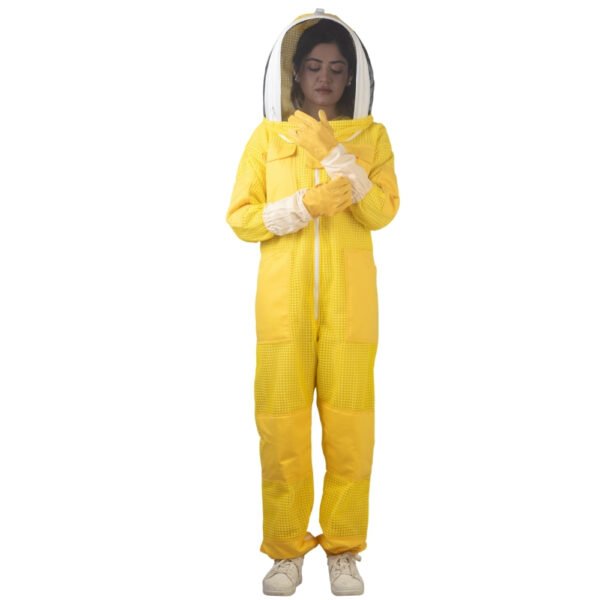 Yellow beesuit with protective veil and gloves worn by a beekeeper, full body beekeeping safety suit