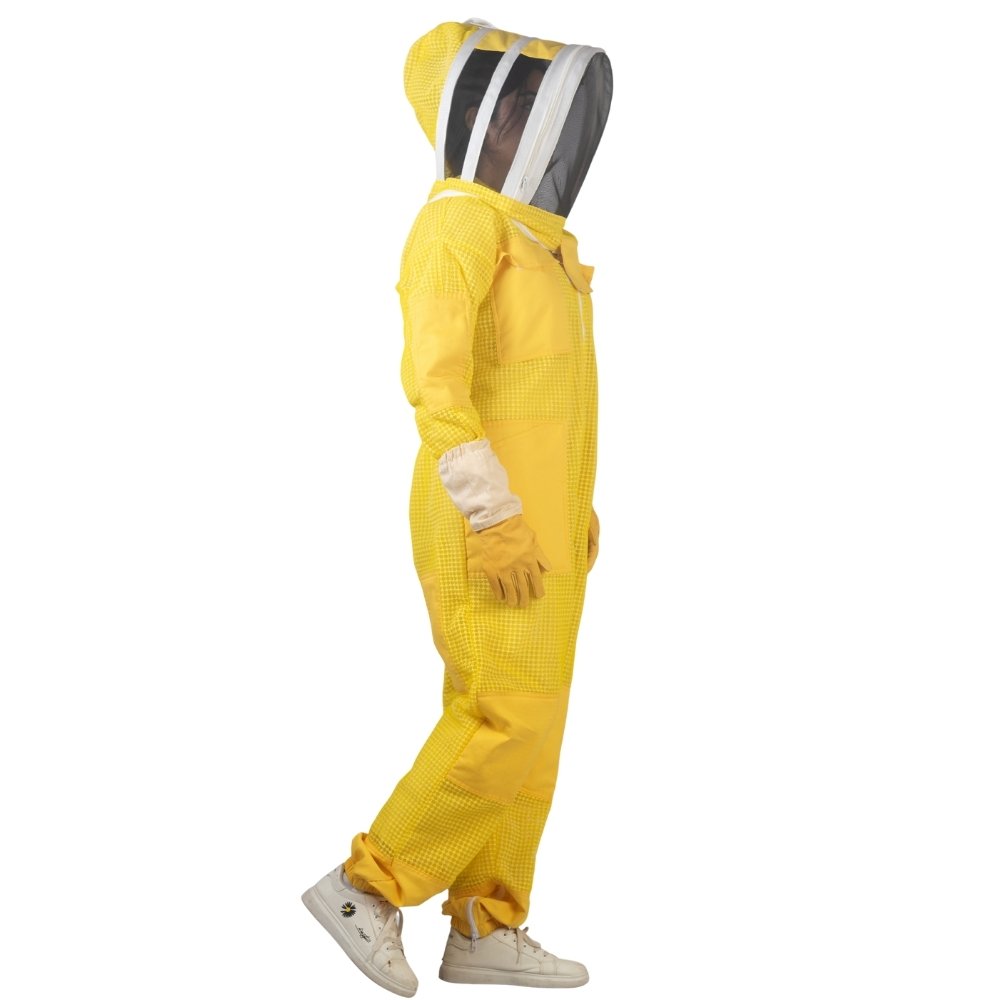 Side view of yellow beesuit with protective veil and gloves for beekeeping safety