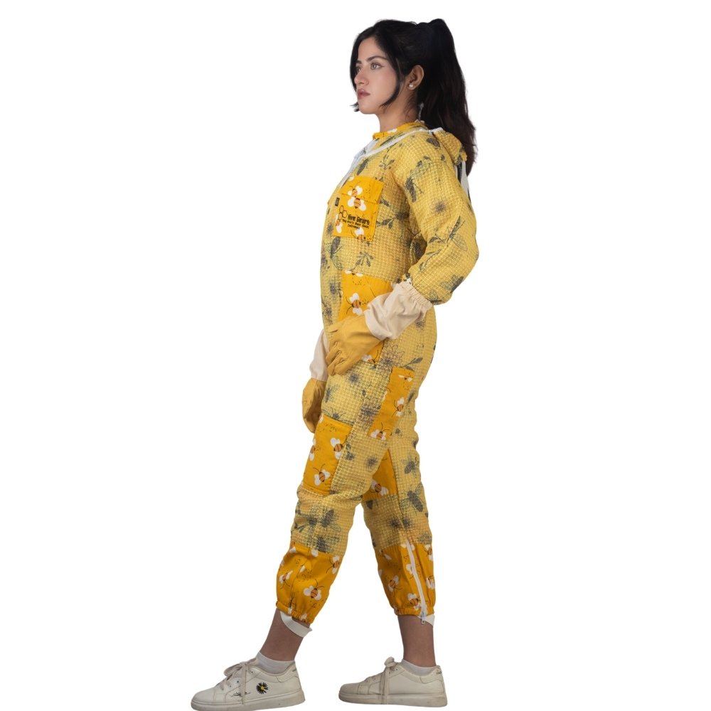 Side view of yellow printed beesuit showing breathable fabric, full body beekeeping protection